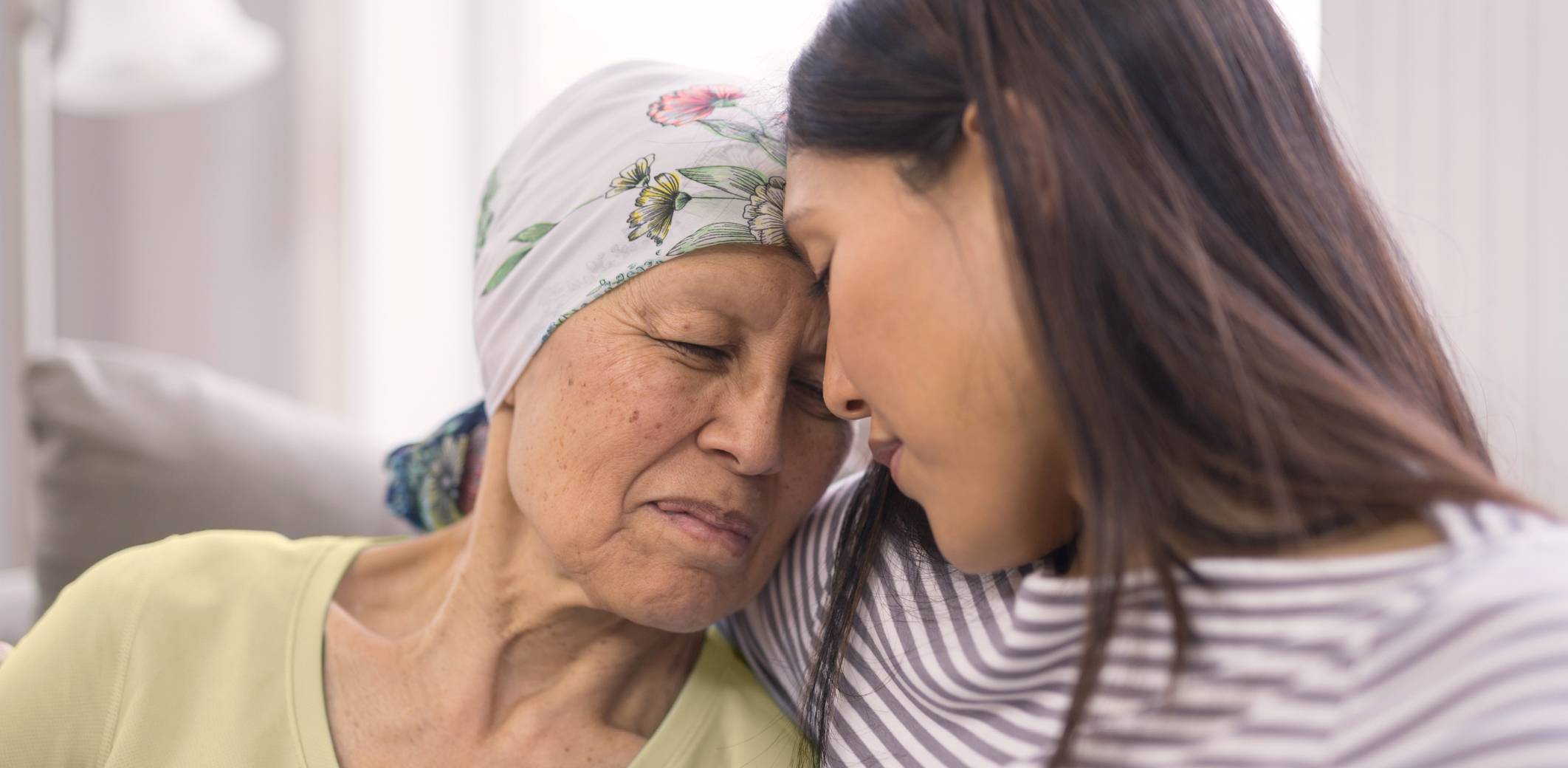 daughter-supporting-ill-mother