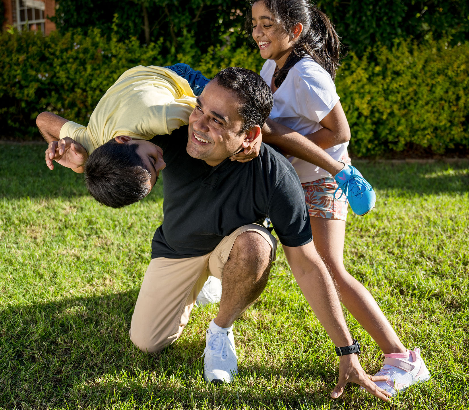 father-daughter-playing-outside