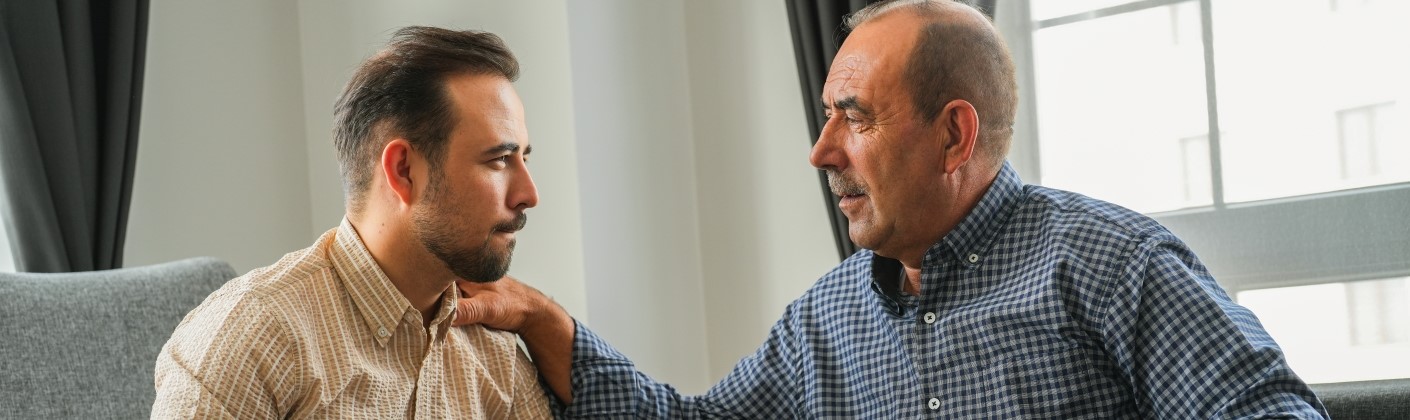 dad supporting his son